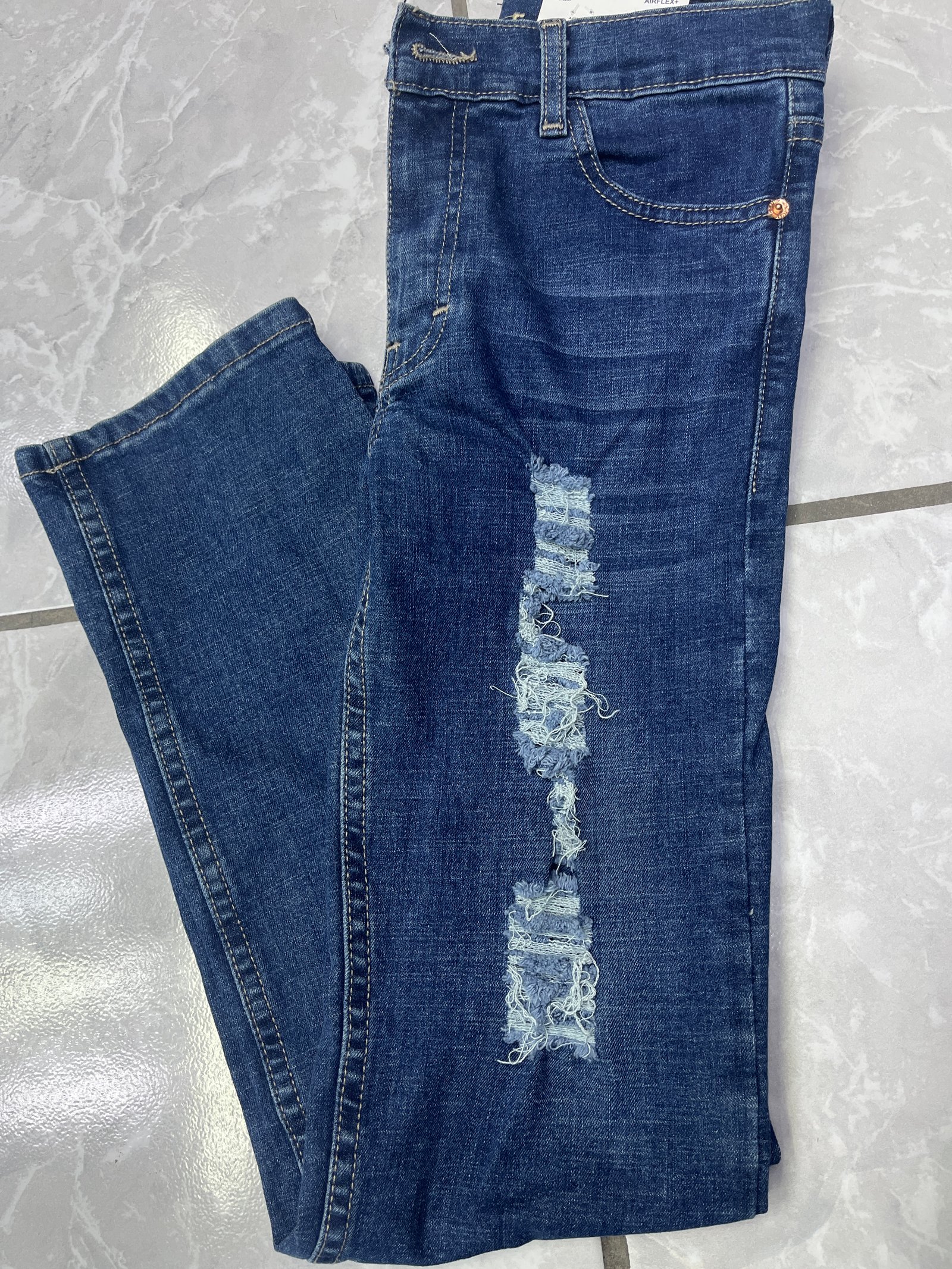 Pantalón Rasgado